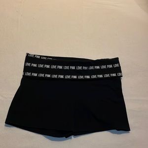 Pink medium size black yoga shorts